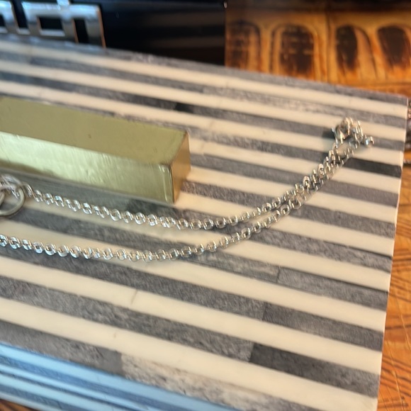 Light silver toned necklace with a variety of circles suspended on silver chain - Picture 13 of 13